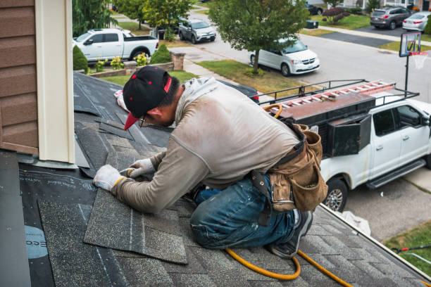 Professional Roof Replacement technician working in Morris, NY
